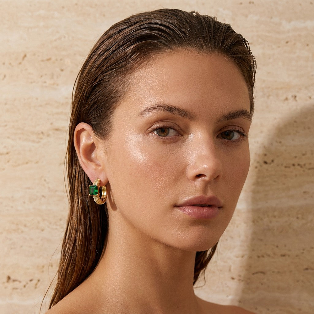 emerald-gold-plated-brass-earring-front-emerald-flare