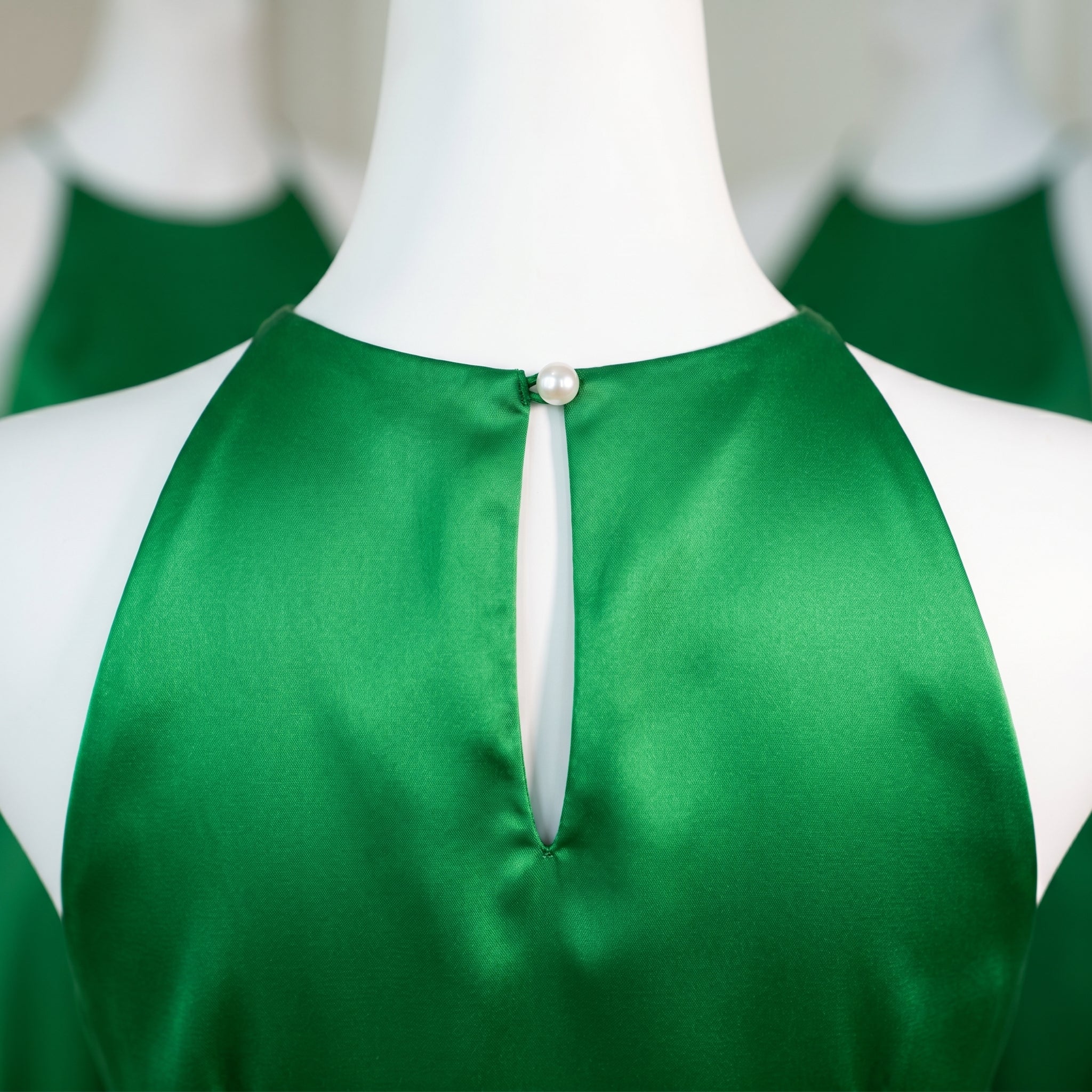 emerald-satin-halter-dress-draping-feature