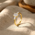 gold-moissanite-ring-on-hand-cloudmist-empress