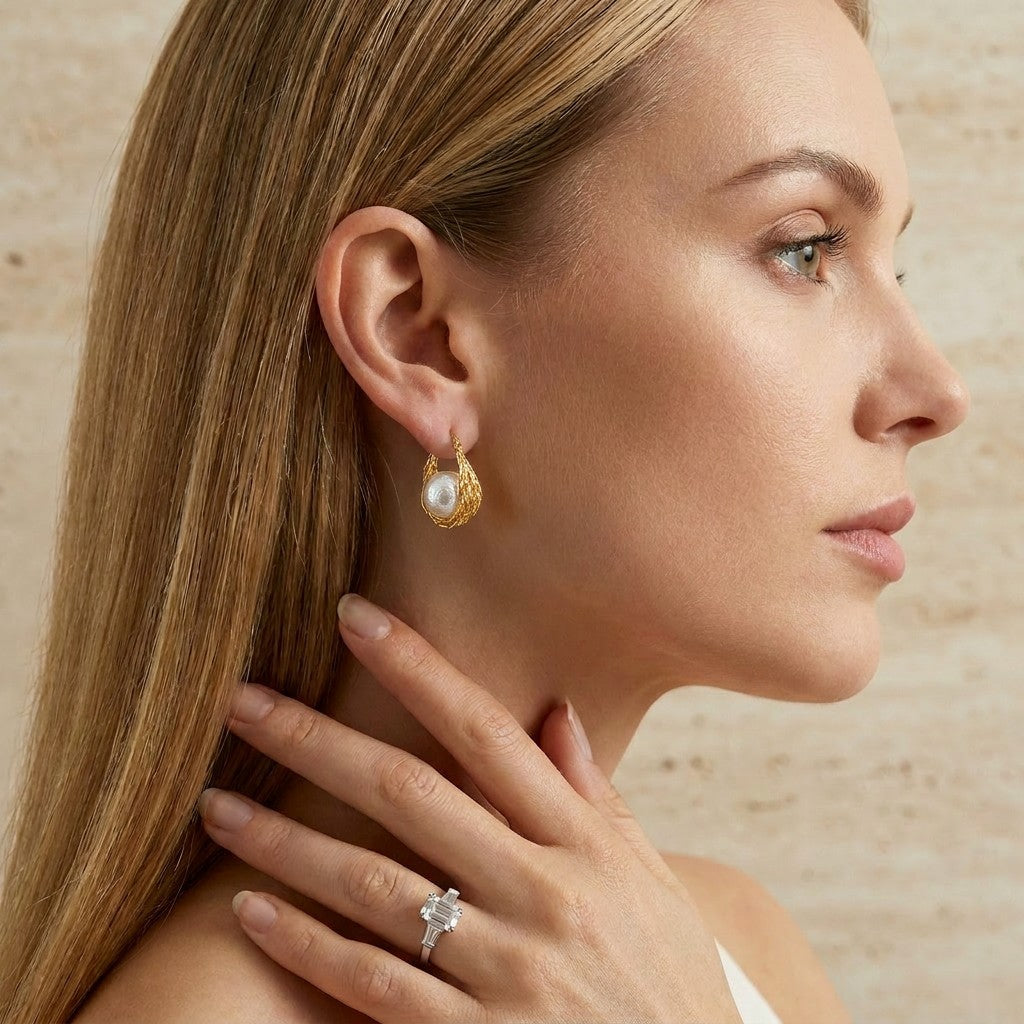gold-plated-pearl-knot-earrings-model-front-luna-knot