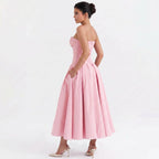 pink-polyester-corset-midi-dress-side-model-eos-radiance