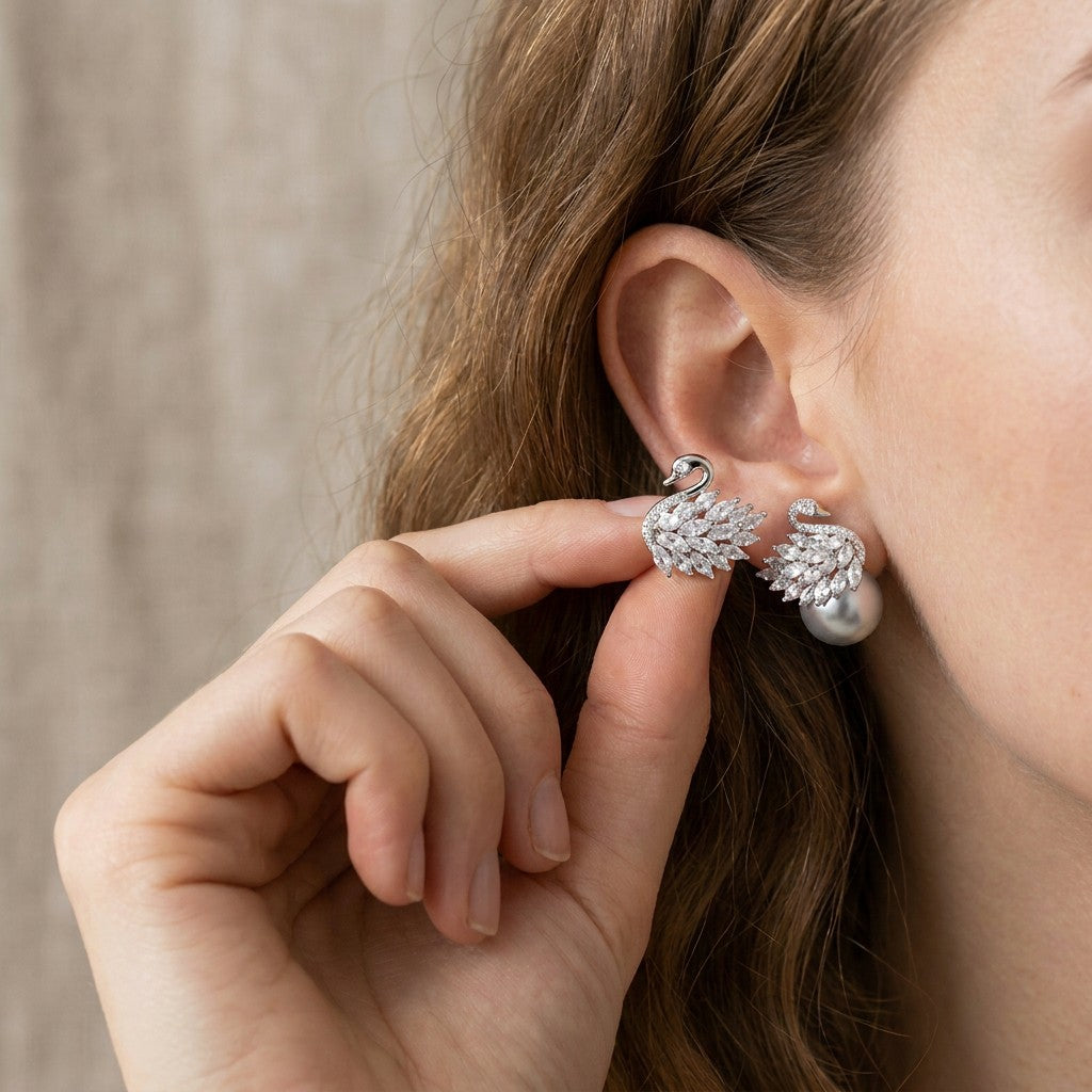 silver-cubic-zirconia-pearl-earrings-ear-close-up-moonlit-serenade