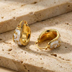 white-gold-shell-hoop-earring-side-model-aura-shell