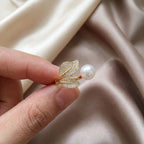 white-pearl-hand-model-daphne-petal-gold-ring